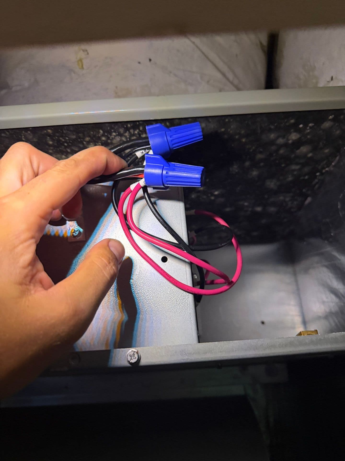 Furnace repair technician servicing a heating system in Tampa FL - Protek Heating & Cooling