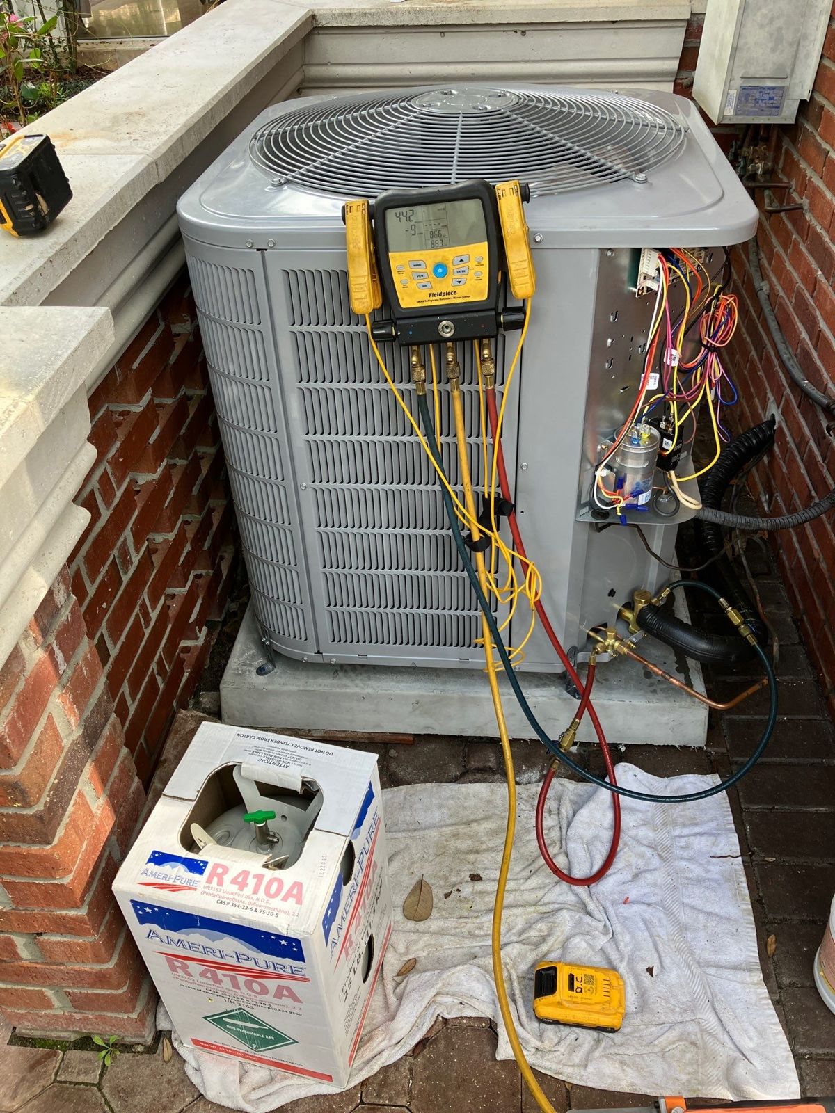 Second new heat pump outdoor unit on gauges during startup