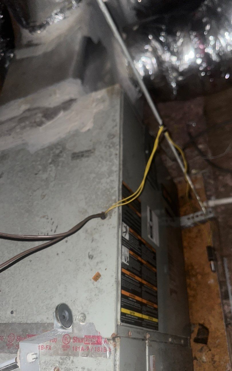 Old horizontal air handler in the attic before replacement
