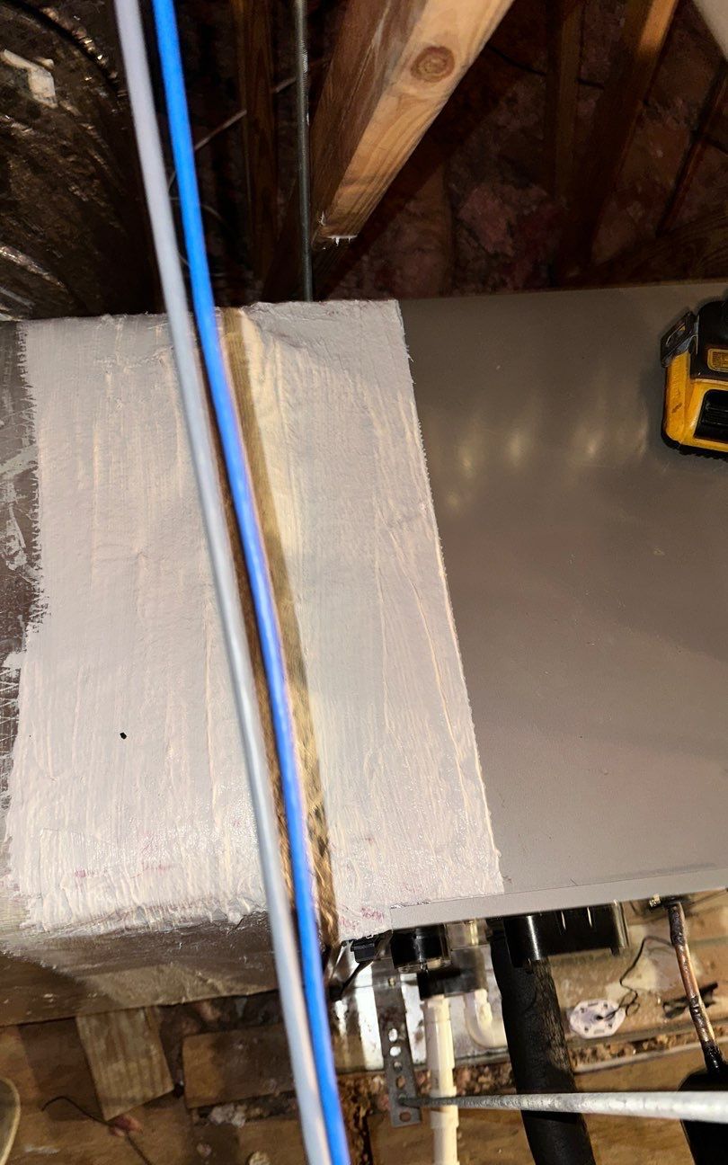 Plenum connection sealed with mastic on the new attic air handler