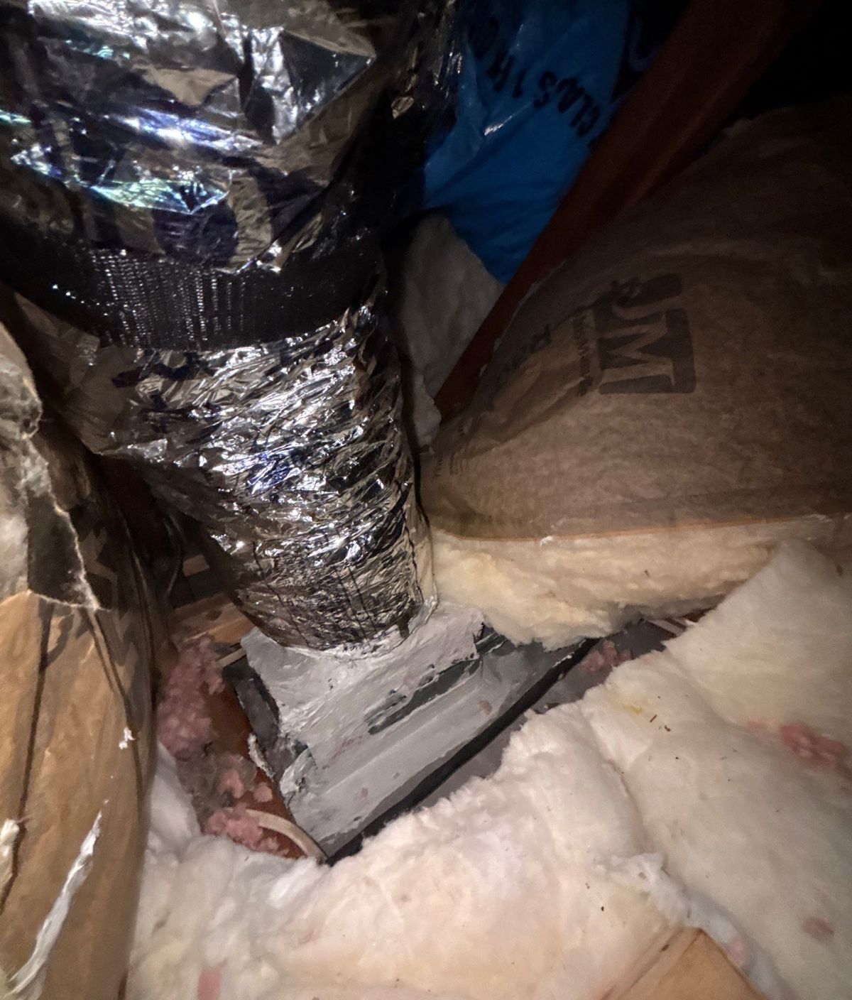 New supply boot and flex duct connection in a Lutz attic