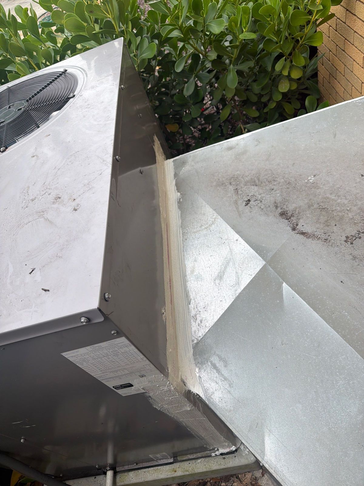New sheet metal duct transition at the outdoor package unit