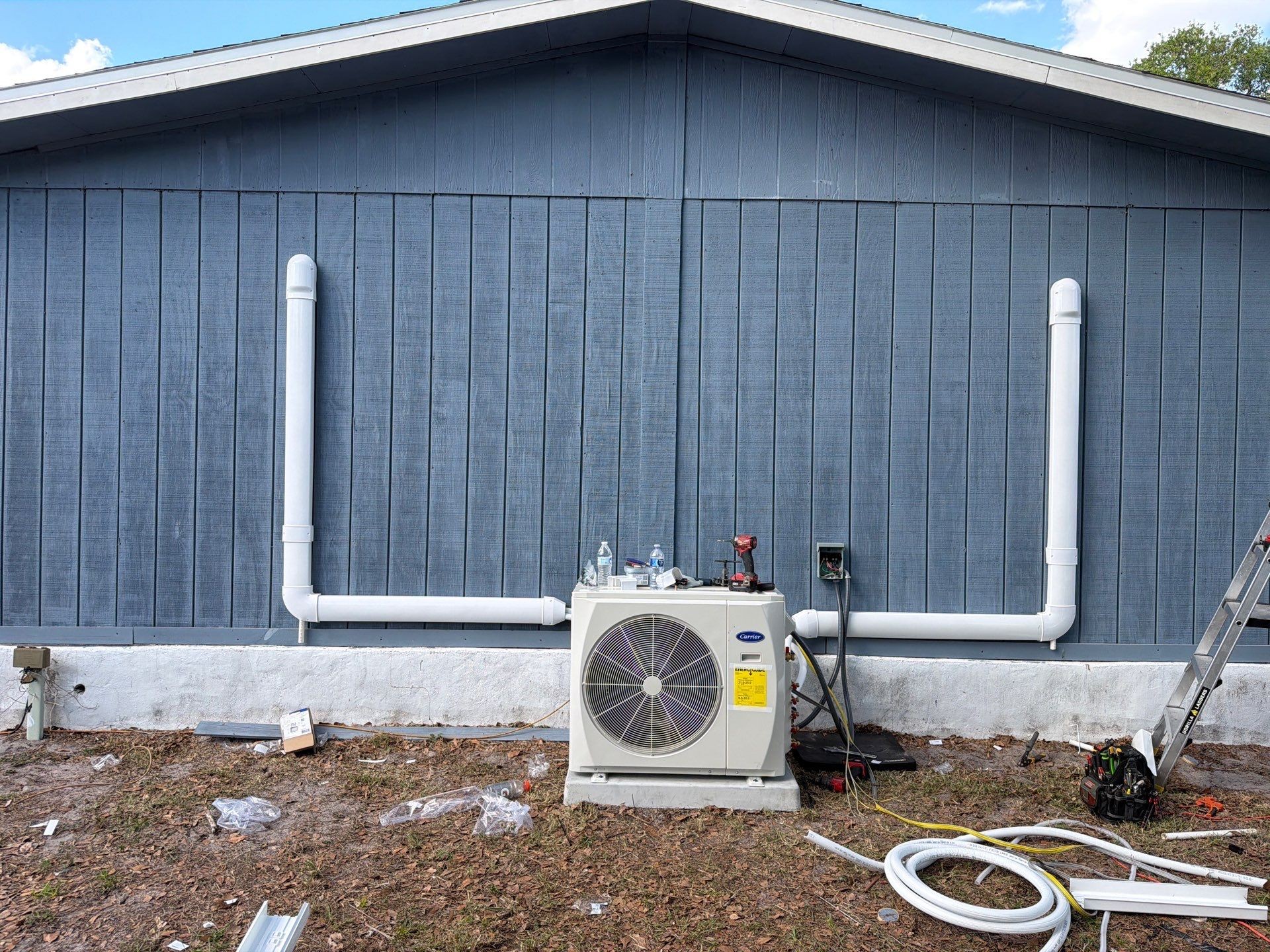 Finished ductless mini-split outdoor unit with clean line-hide runs in Riverview, FL
