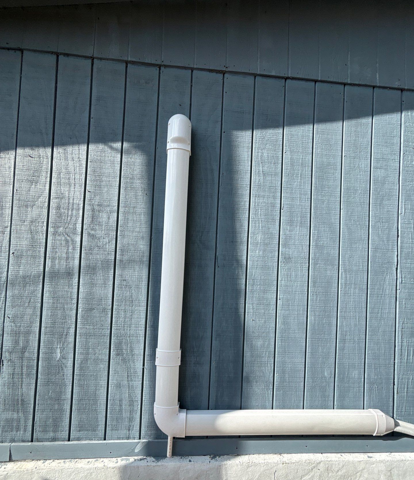 Vertical line-hide run on the exterior wall after mini-split installation