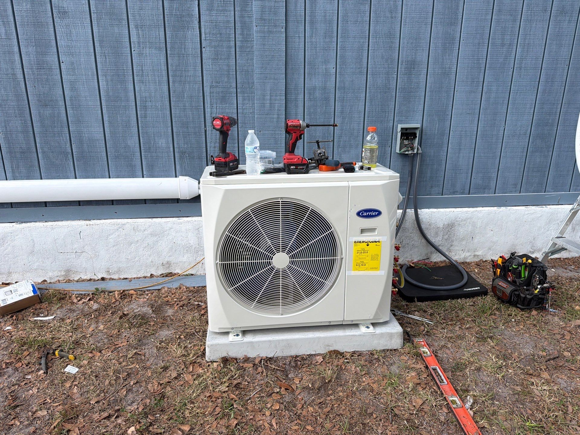 New mini-split outdoor unit set on its pad during installation in Riverview, FL