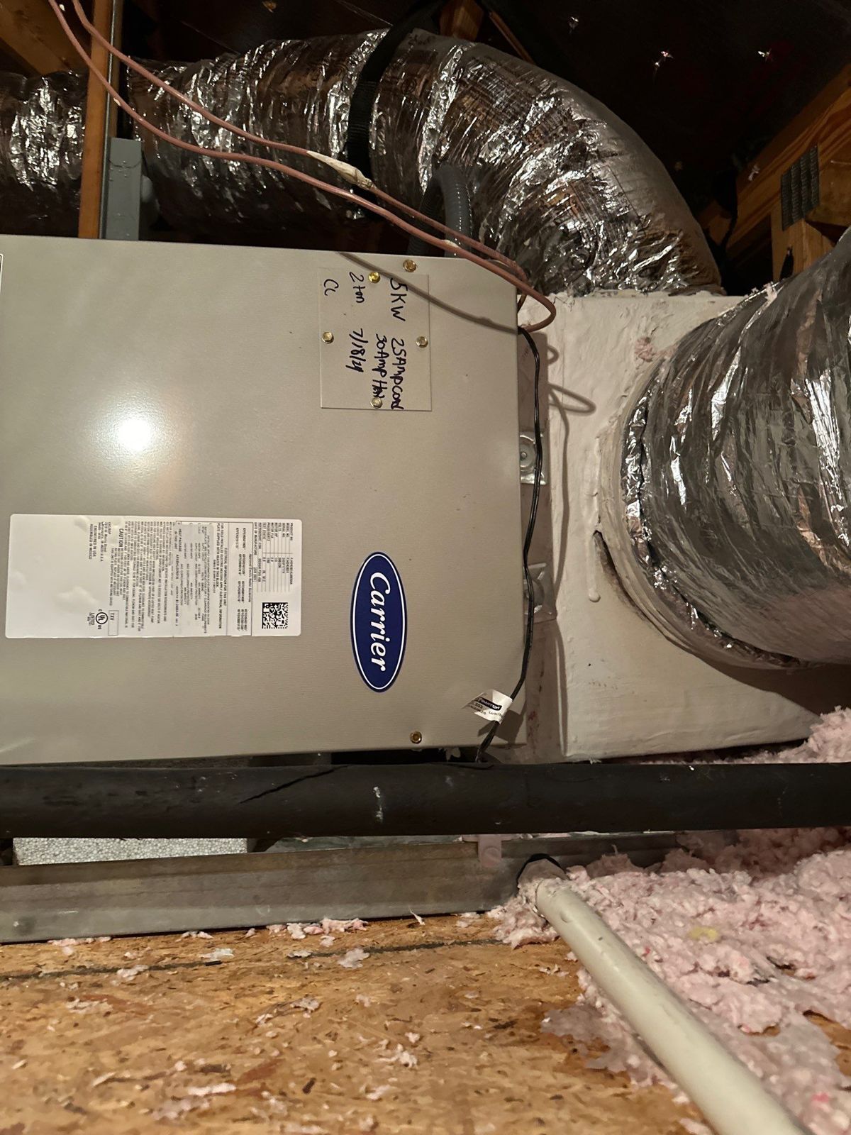 New horizontal air handler in an Auburndale attic tied into the supply plenum