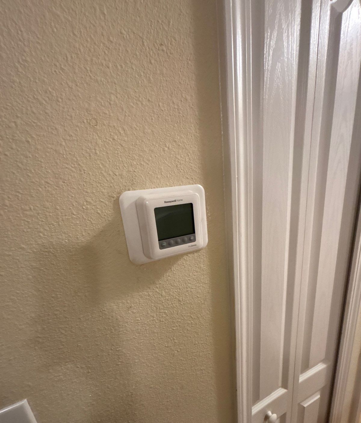 New programmable thermostat installed in a Land O' Lakes home