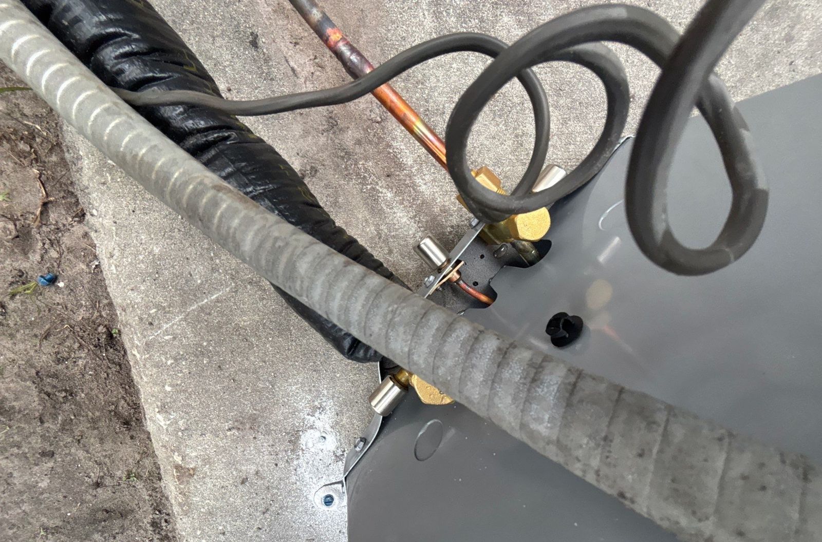 Line set connections at the new heat pump outdoor unit