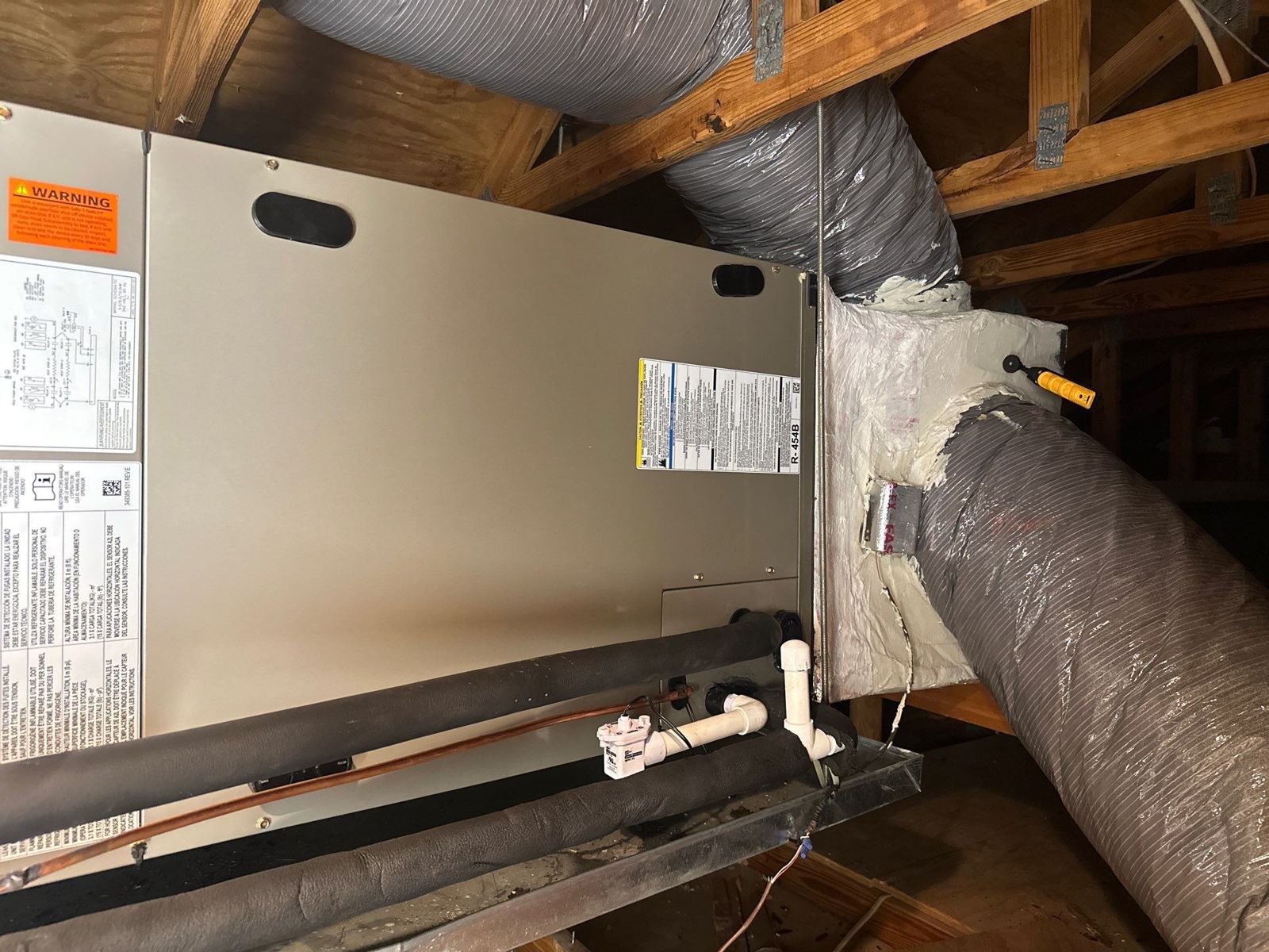 New horizontal air handler installed in the attic of a New Tampa home
