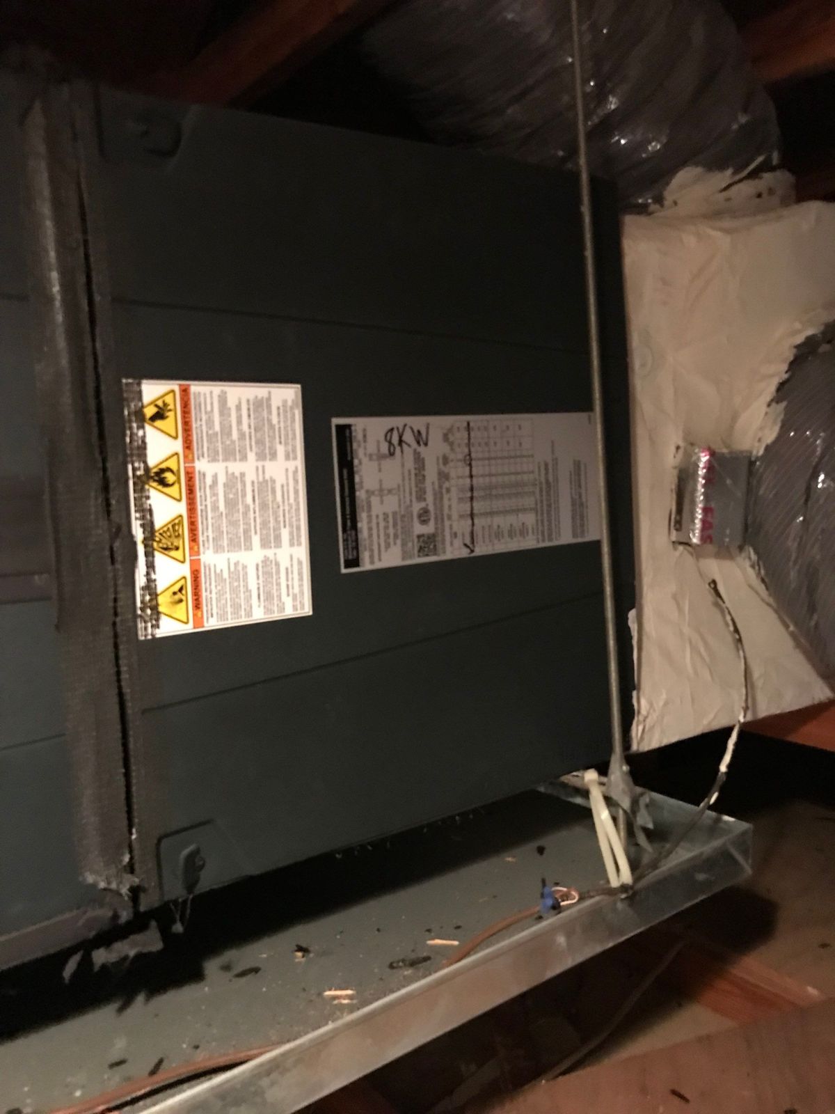 Old horizontal air handler in the attic of a New Tampa home